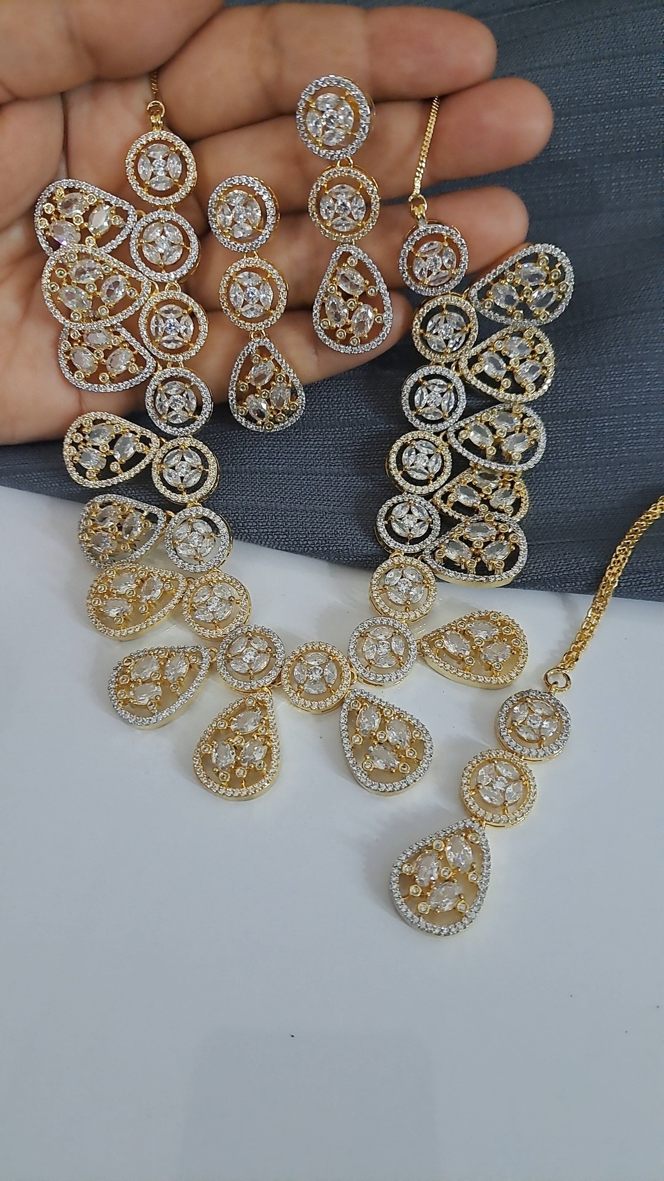 Clear Ad stone golden color necklace set